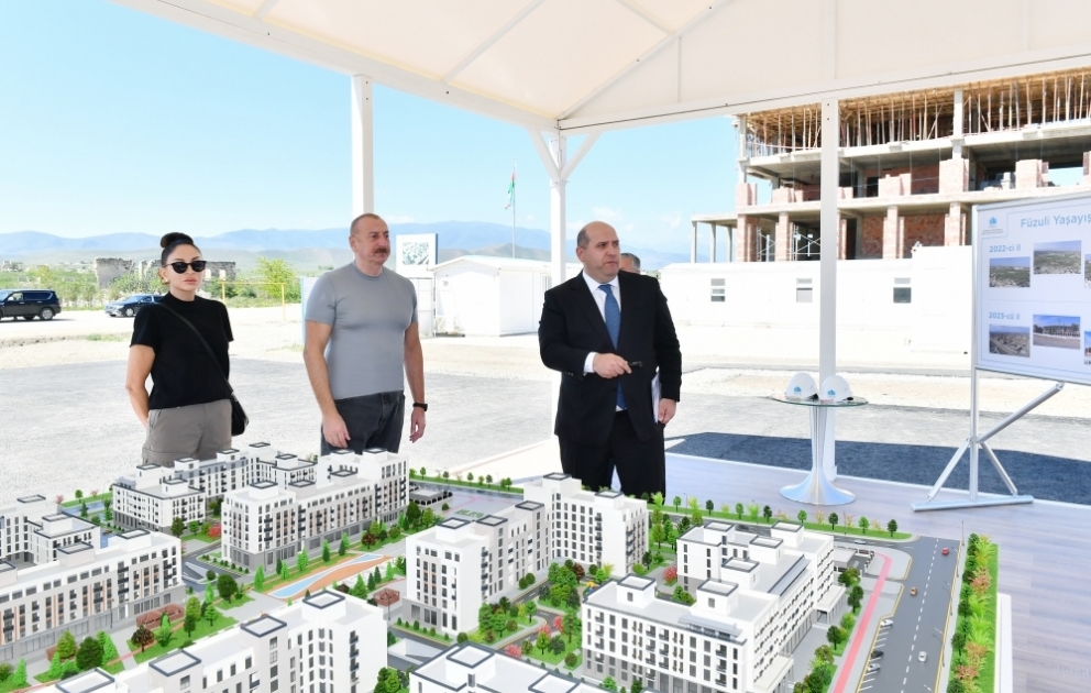 President Ilham Aliyev and First Lady Mehriban Aliyeva examined progress of work done by MIDA in Fuzuli residential complex VIDEO